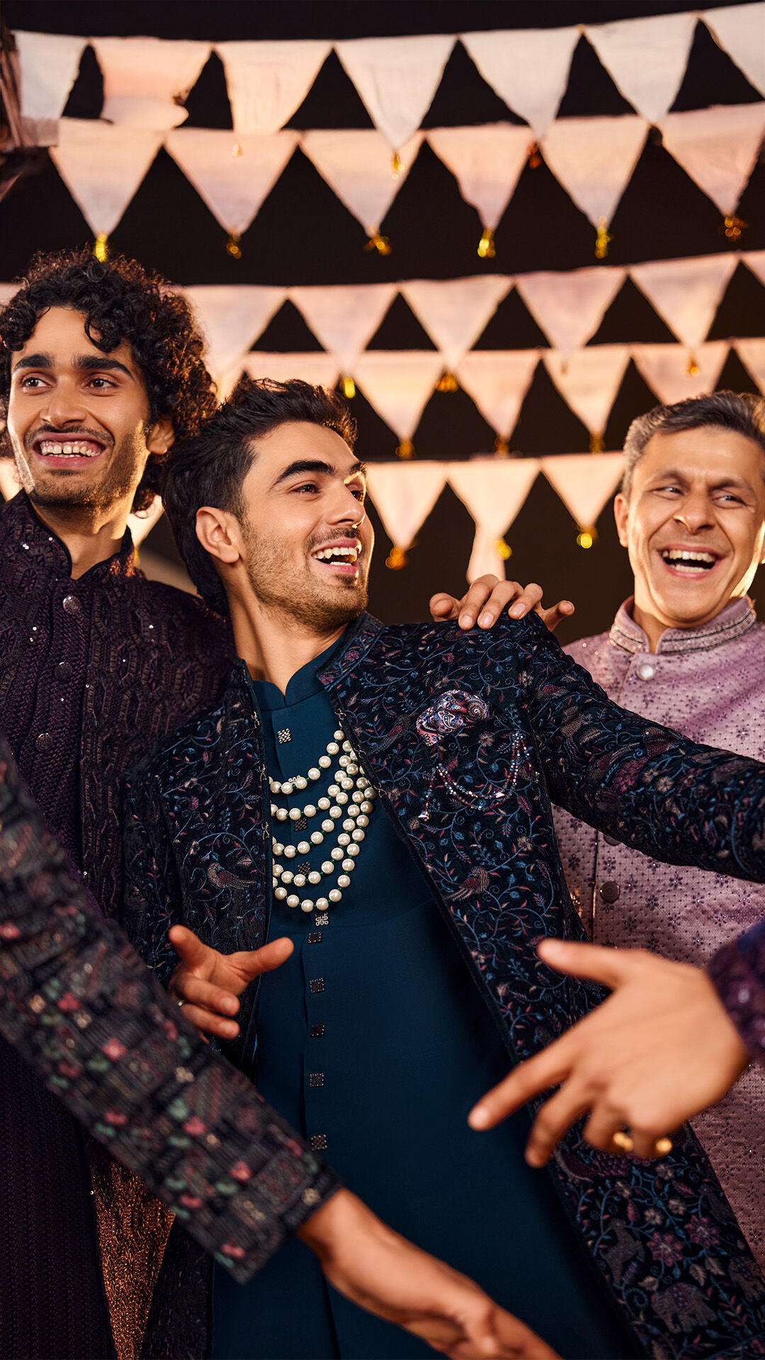 mens dancing and enjoying wearing Printed Sherwani in a vibrant colour